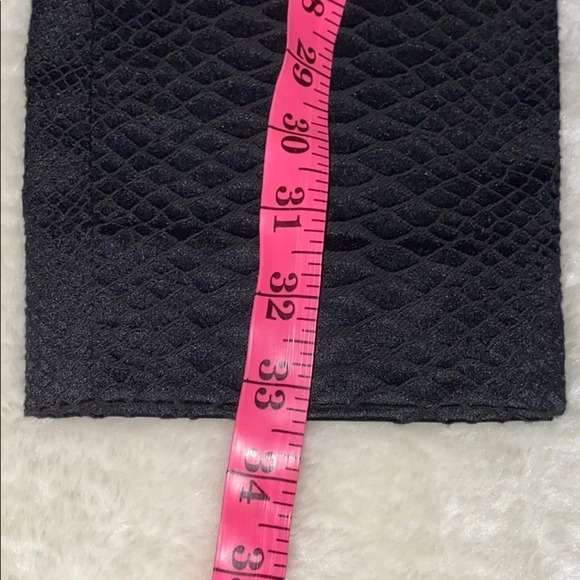 Ricki’s  black snake print ankle pants 0 - Picture 12 of 13